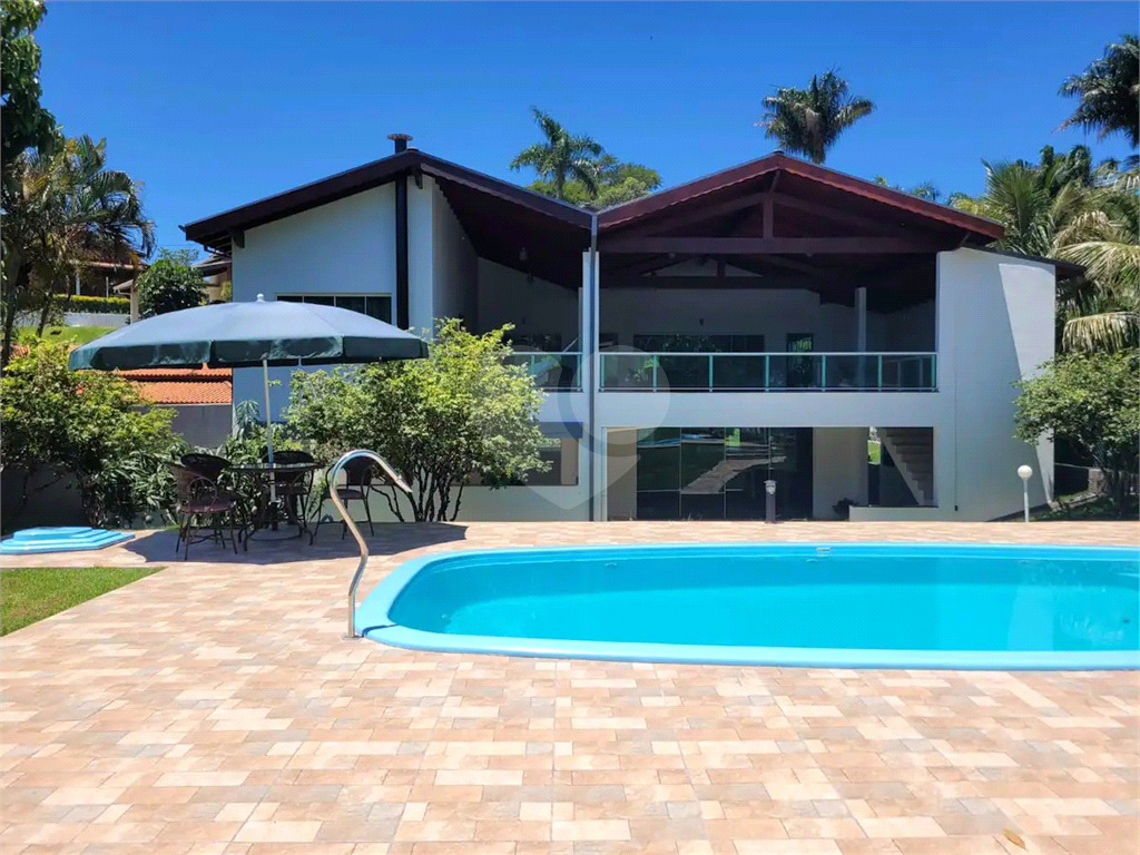 Casa de Condomínio à venda e aluguel com 6 quartos, 540m² - Foto 58
