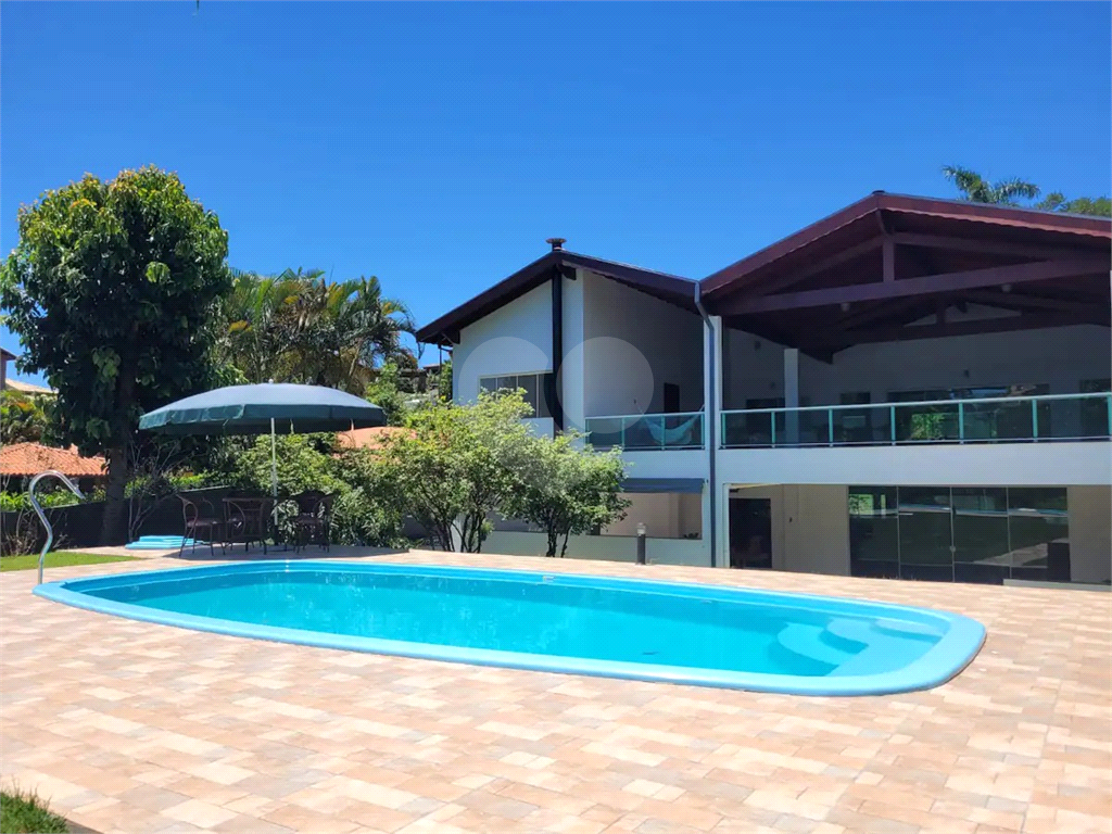 Casa de Condomínio à venda e aluguel com 6 quartos, 540m² - Foto 59