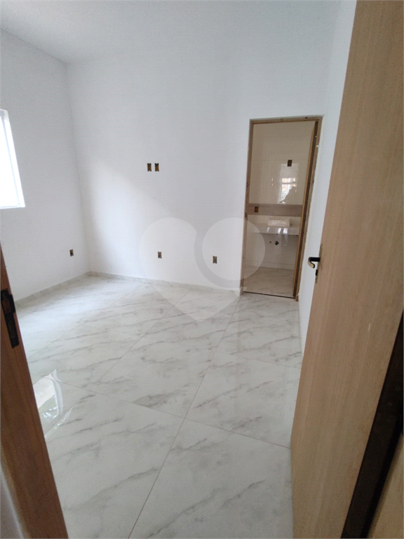 Casa à venda com 3 quartos, 65m² - Foto 11