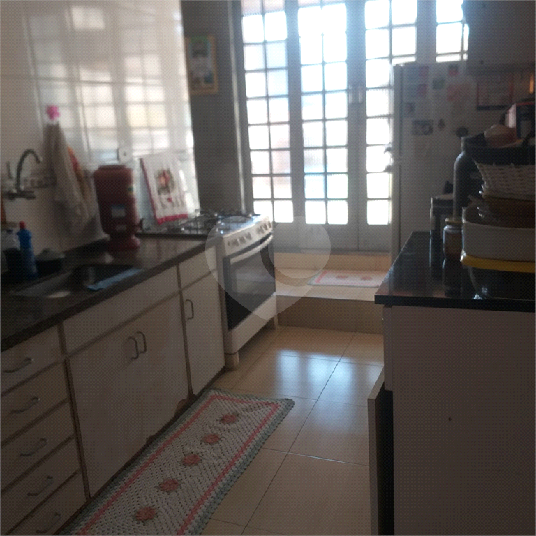 Casa à venda com 5 quartos, 166m² - Foto 4