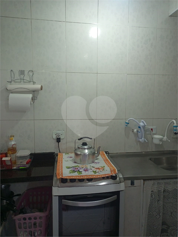 Imóvel com 3 casas, 3 vagas. Vila Nivi.