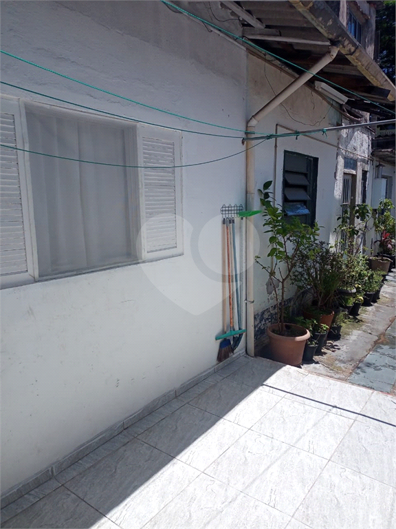 Imóvel com 3 casas, 3 vagas. Vila Nivi.