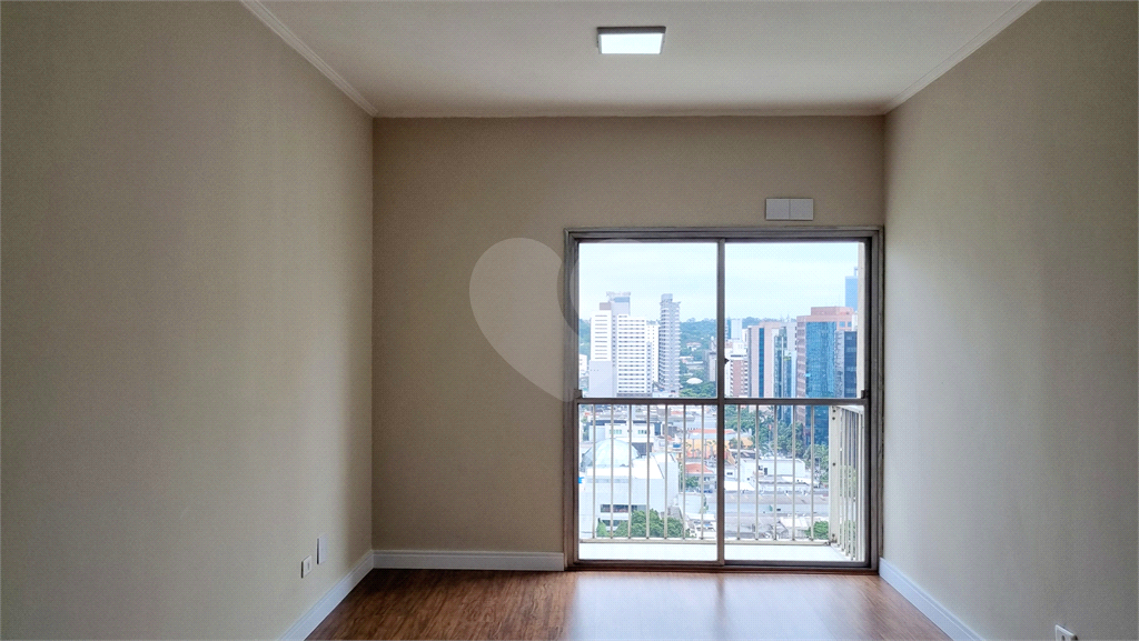 Apartamento reforamado a venda com 1 dormitório, sala 2 ambientes, sacadas e 1 vaga na Vila Olímpia