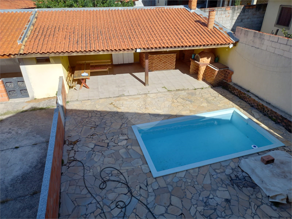 Casa à venda com 4 quartos, 291m² - Foto 1