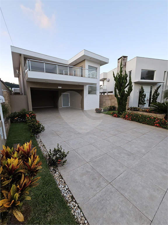 Casa de Condomínio à venda e aluguel com 4 quartos, 340m² - Foto 1