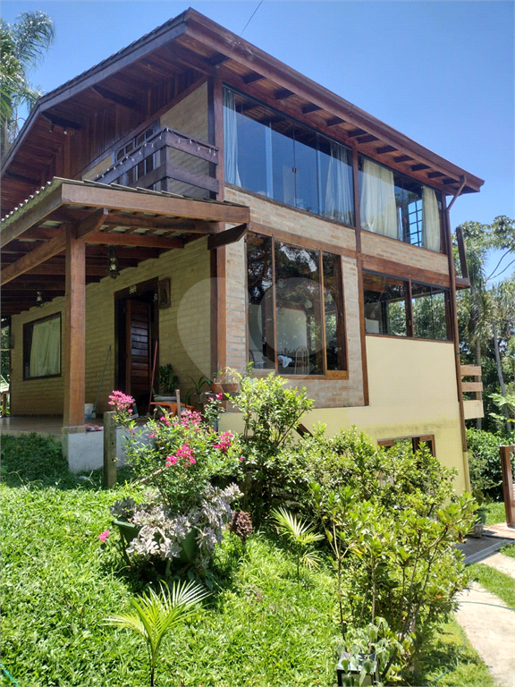 Casa de Condomínio à venda com 4 quartos, 290m² - Foto 1