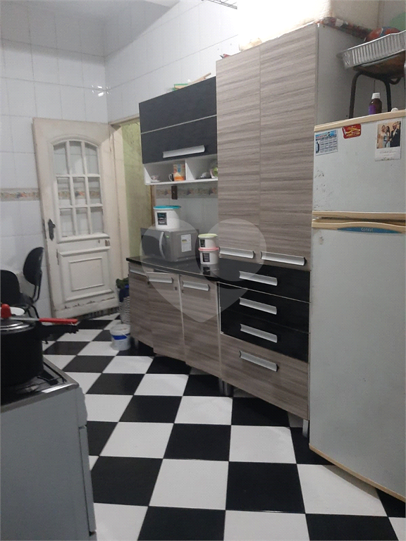 Vendo excelente sobrado de 4 lajes com 4 casas para residencia ou investimento