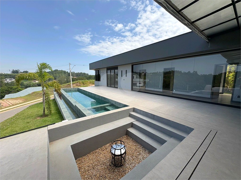 Casa de Condomínio à venda com 4 quartos, 255m² - Foto 1
