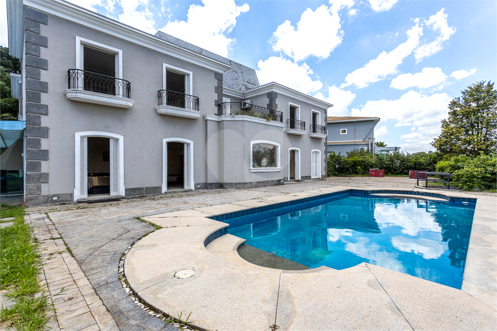 Casa de Luxo à Venda no Alphaville Residencial 0 – 4 Suítes, 1500m² de Terreno, Garagem para 10+ Car