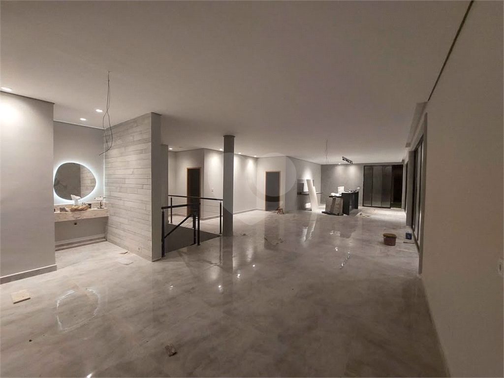 Casa condomínio em Santa Isabel para venda com 330m2, 3 quartos, 3 suíte, 2 salas, cozinha, 5 banheiros, área de serviço e 5 vagas de garagem