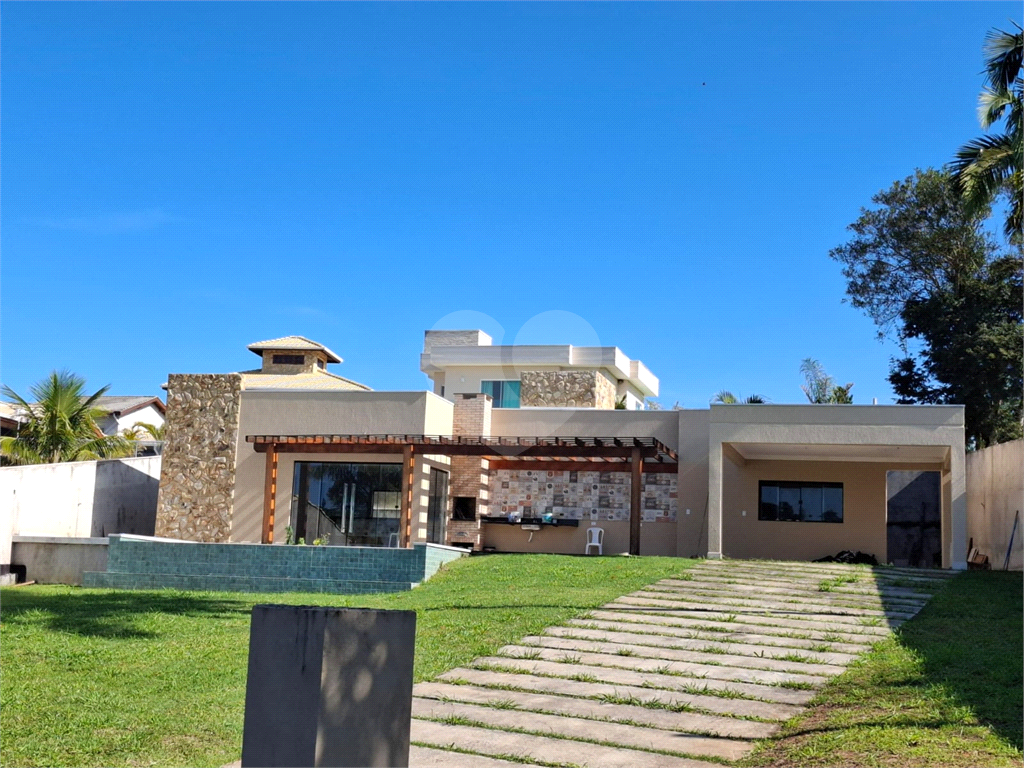 Casa condomínio em Santa Isabel para venda com 190m2, 3 quartos, 1 suíte, 2 salas, cozinha, 2 banheiros, área de serviço, quintal e 2 vagas de garagem