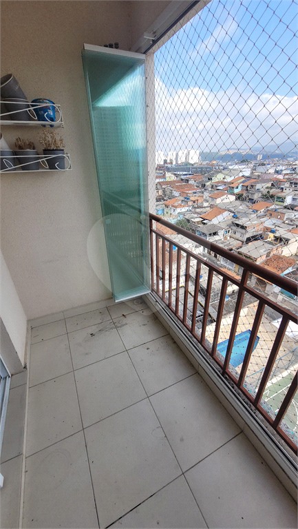 Apartamento a venda. Picanço. 3 quartos (1 suíte), sacada, cozinha americana. 2 vagas