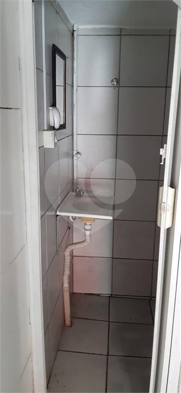 Imóvel com duas casas construídas, totalizando 96 m², na Rua Tanque Velho.