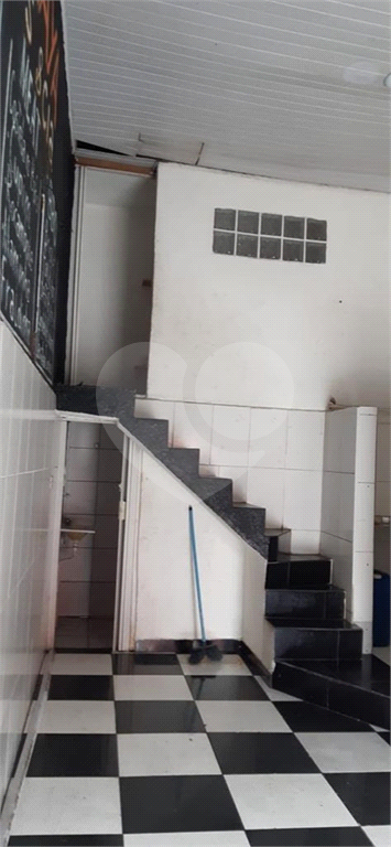 Imóvel com duas casas construídas, totalizando 96 m², na Rua Tanque Velho.