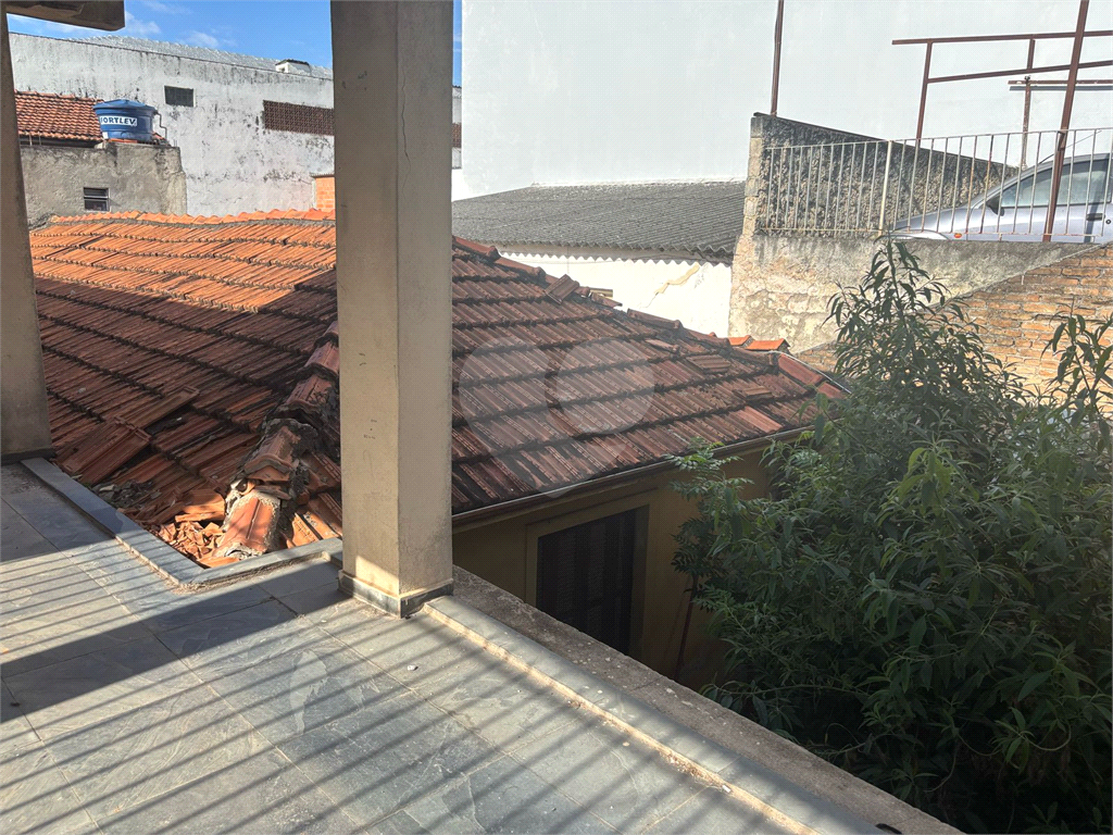 Terreno com casa e sobrado à venda em Tucuruvi - SP