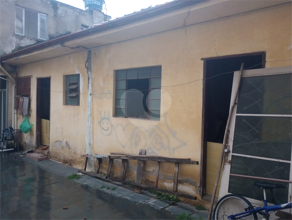 Terreno com casa e sobrado à venda em Tucuruvi - SP