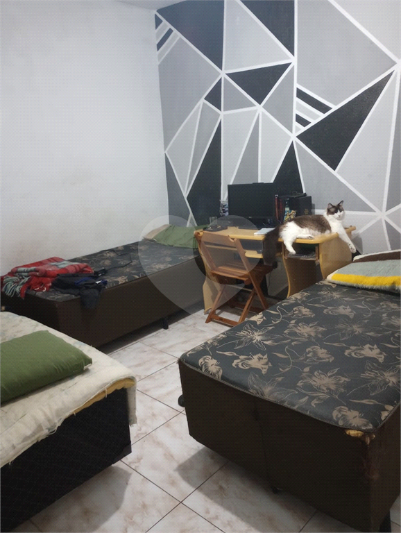 Terreno com casa e sobrado à venda em Tucuruvi - SP