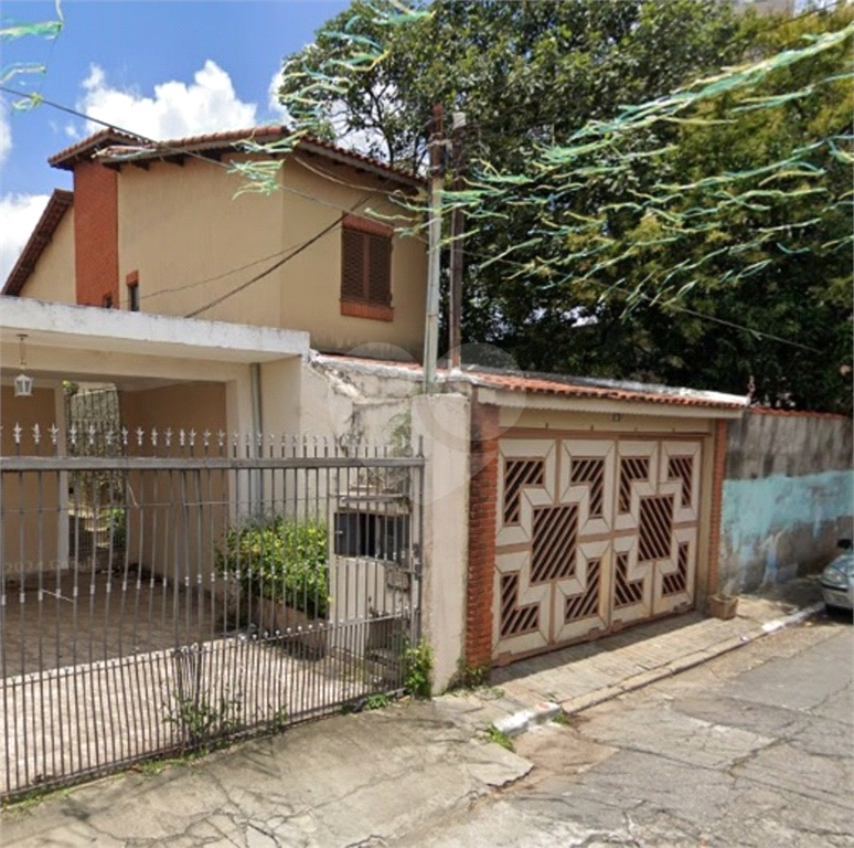 Sobrado à venda com 4 quartos, 149m² - Foto 1