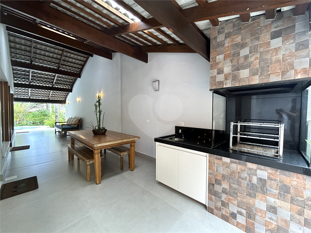 Excelente Casa Térrea em Condomínio Fechado na frente da Praia de Toque Toque Pequeno toda Mobiliada 