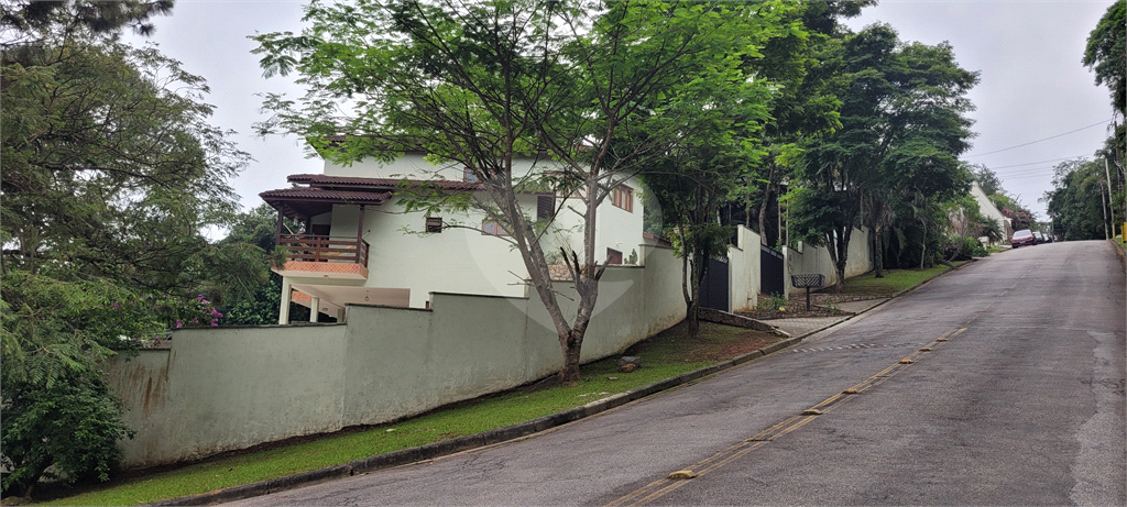 Casa de Condomínio à venda com 4 quartos, 398m² - Foto 1