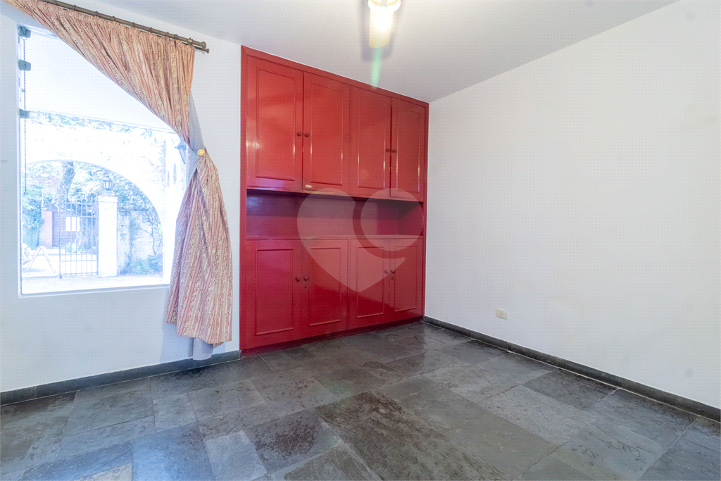 Casa com dois lotes no Alto de Pinheiros