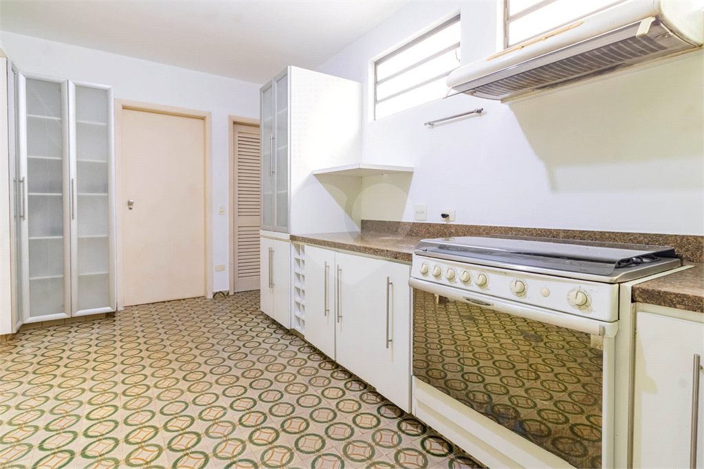 Casa com dois lotes no Alto de Pinheiros