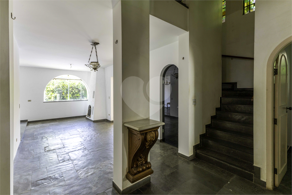 Casa com dois lotes no Alto de Pinheiros