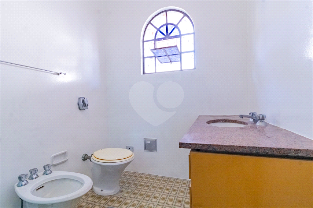 Casa com dois lotes no Alto de Pinheiros