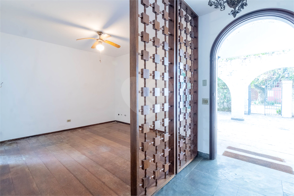 Casa com dois lotes no Alto de Pinheiros