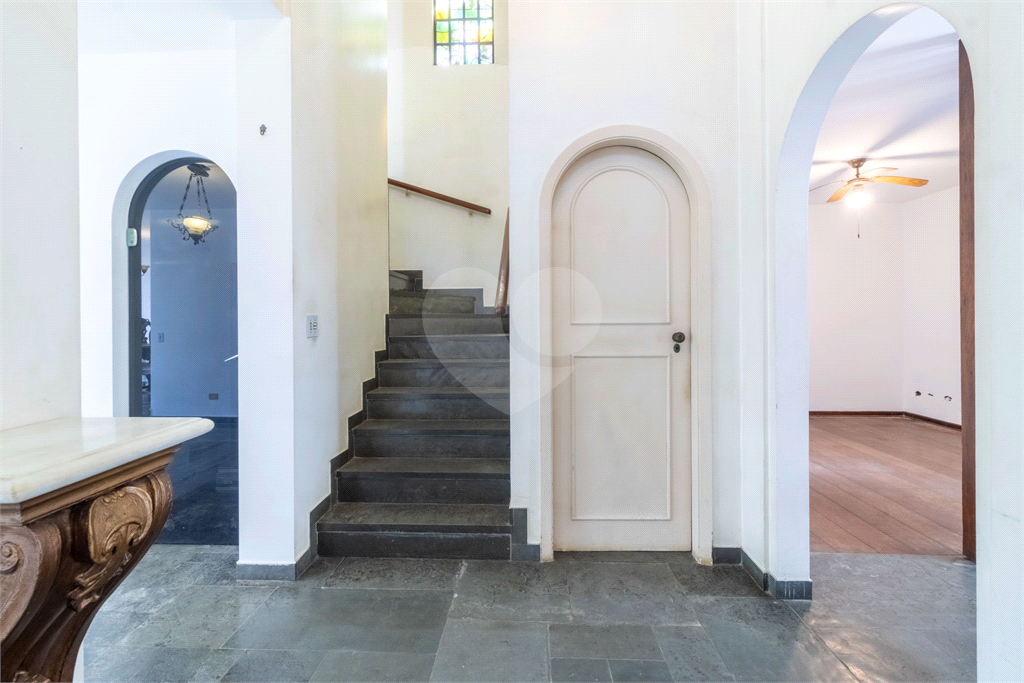 Casa com dois lotes no Alto de Pinheiros