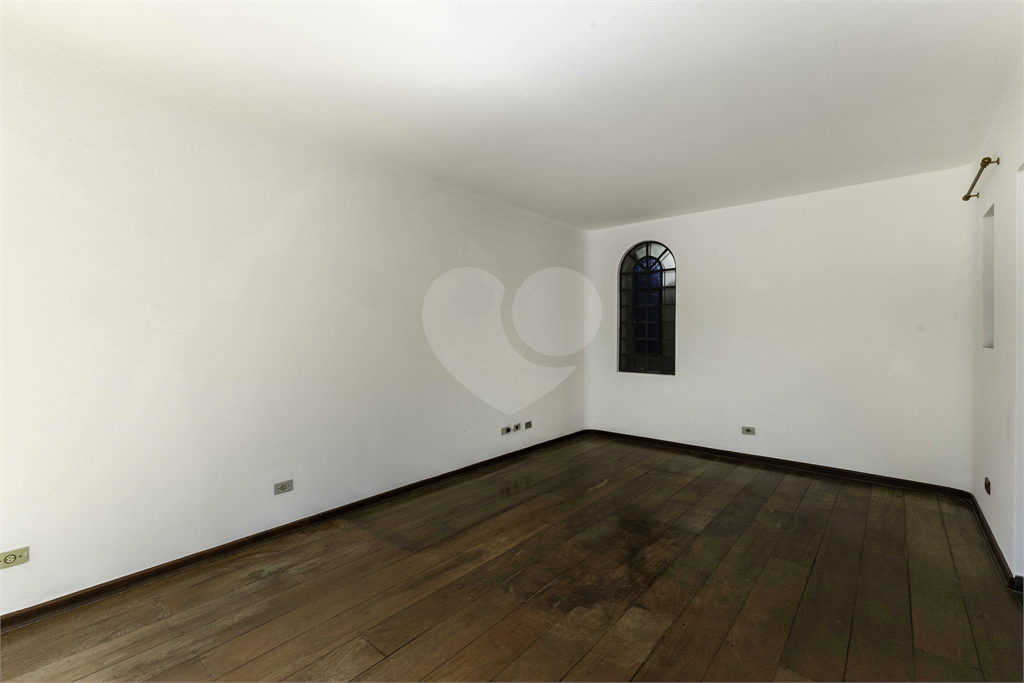 Casa com dois lotes no Alto de Pinheiros