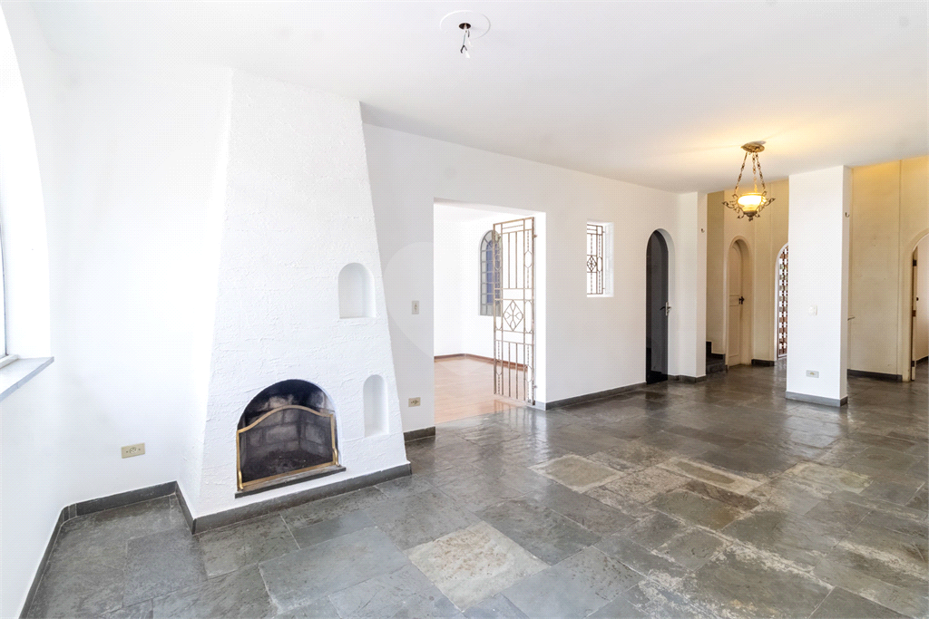 Casa com dois lotes no Alto de Pinheiros