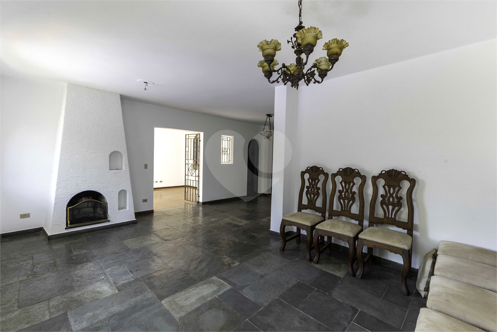 Casa com dois lotes no Alto de Pinheiros