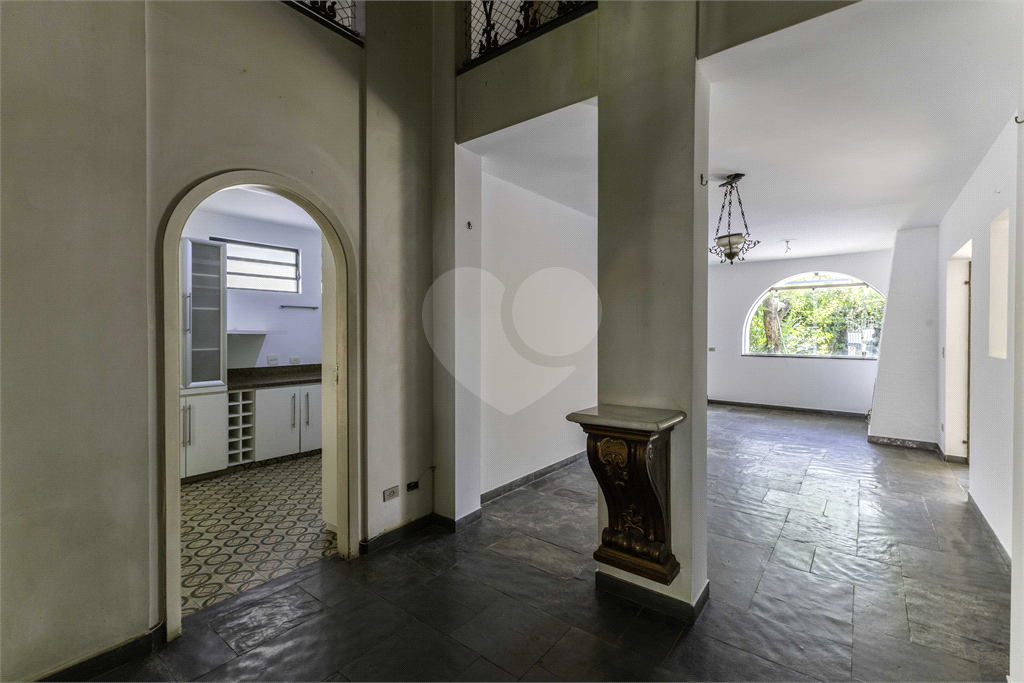 Casa com dois lotes no Alto de Pinheiros