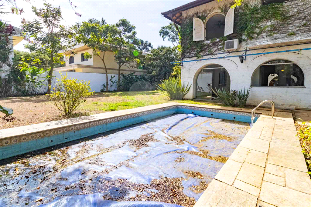 Casa com dois lotes no Alto de Pinheiros
