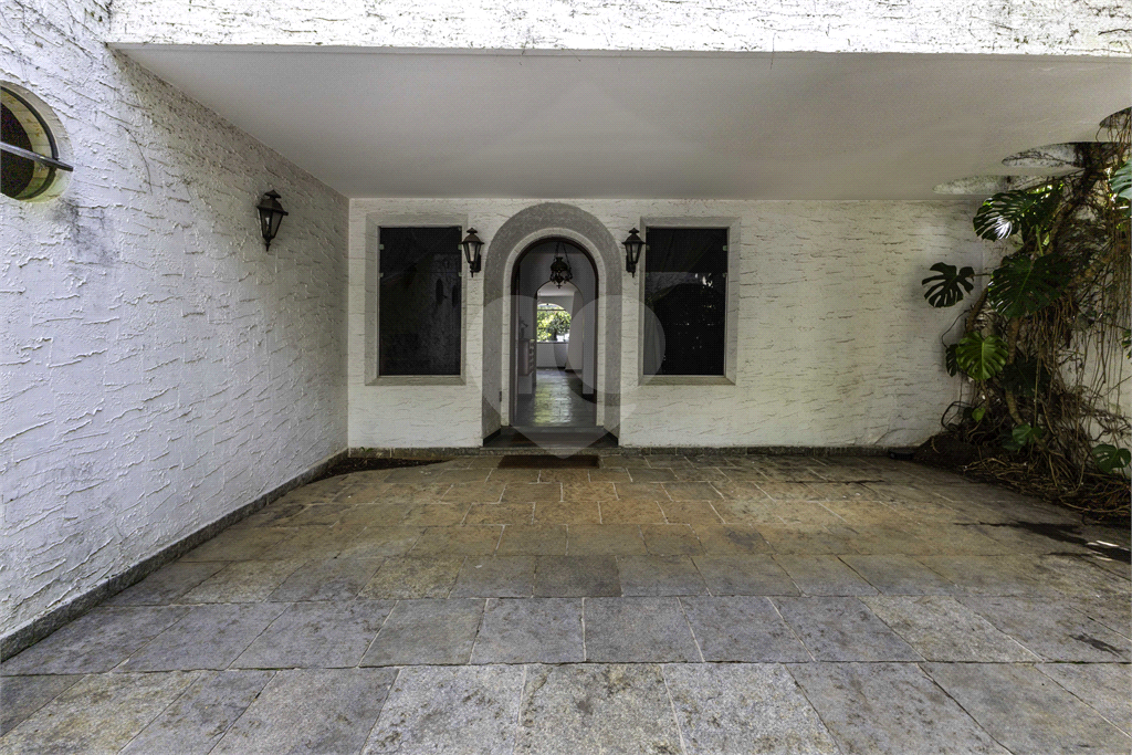 Casa com dois lotes no Alto de Pinheiros