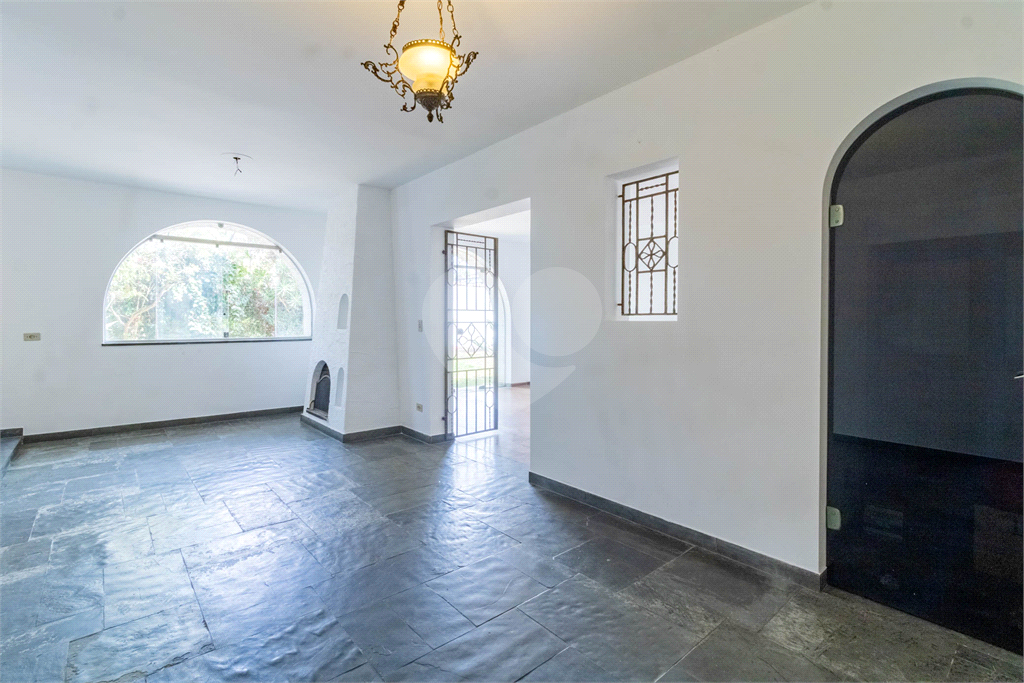 Casa com dois lotes no Alto de Pinheiros