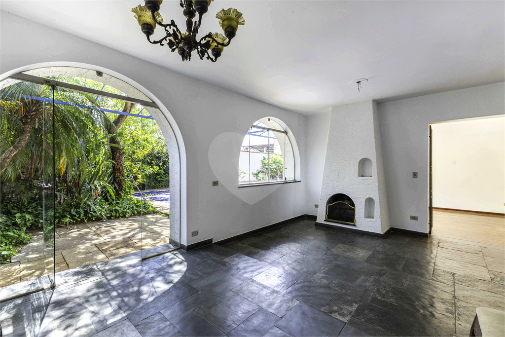 Casa com dois lotes no Alto de Pinheiros