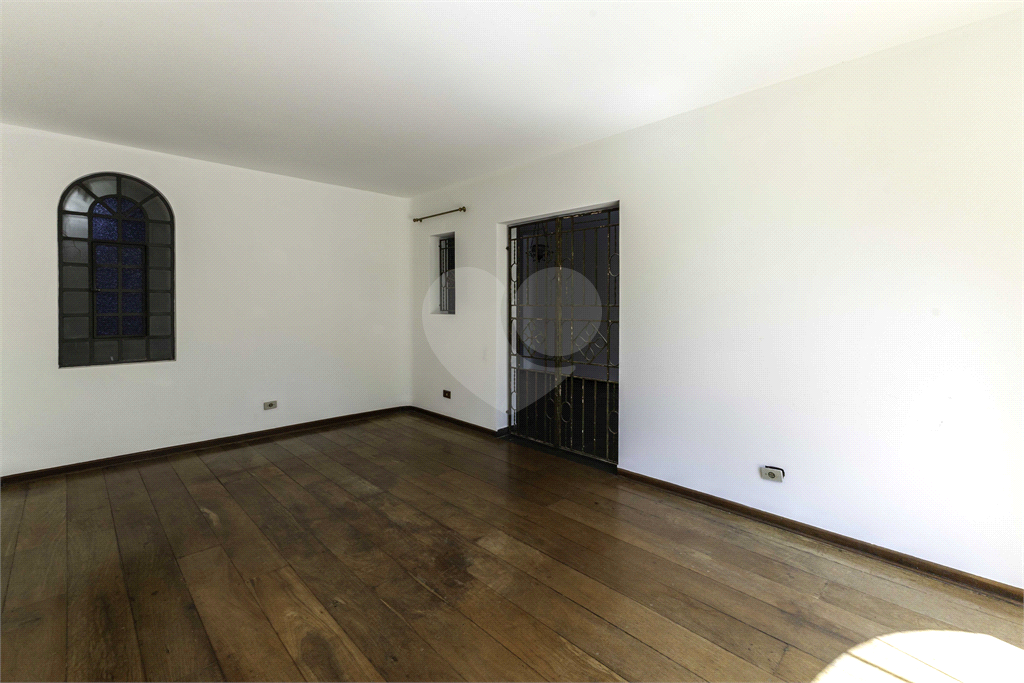 Casa com dois lotes no Alto de Pinheiros