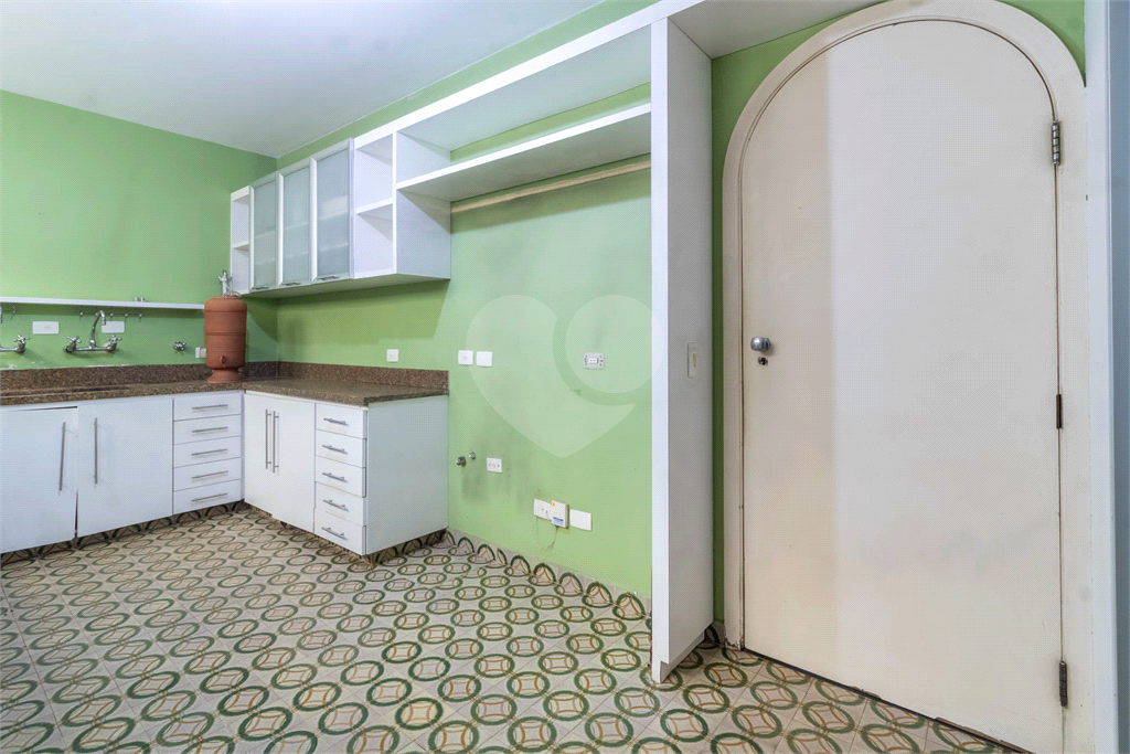 Casa com dois lotes no Alto de Pinheiros