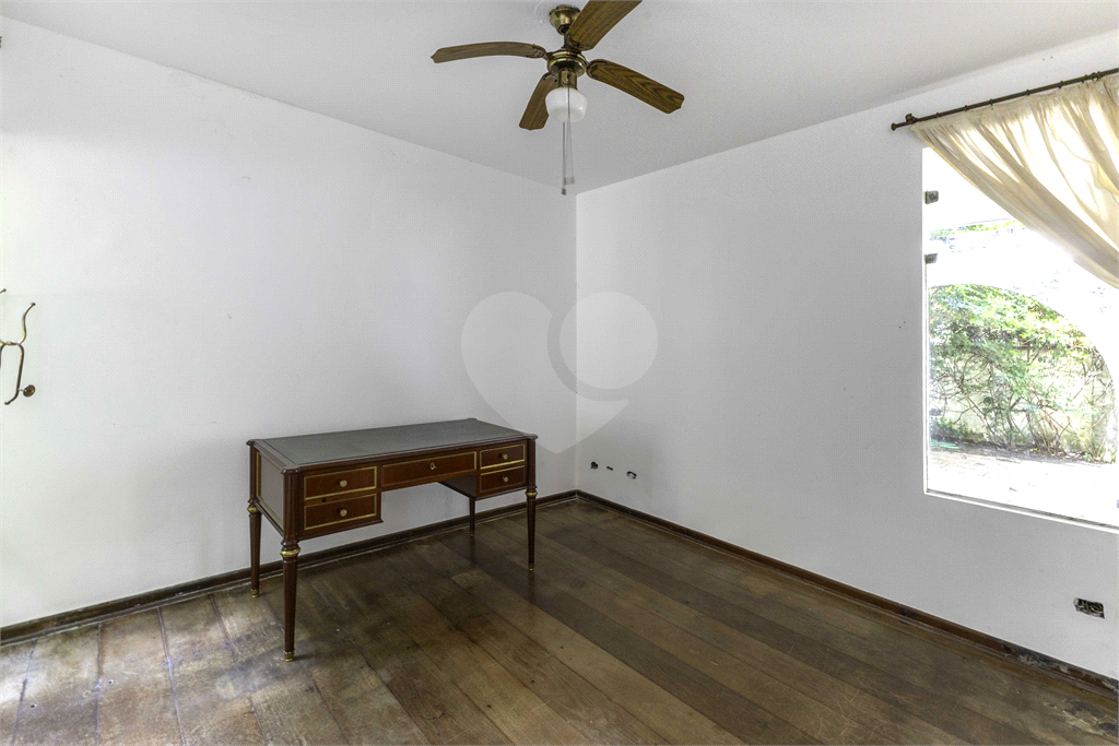 Casa com dois lotes no Alto de Pinheiros