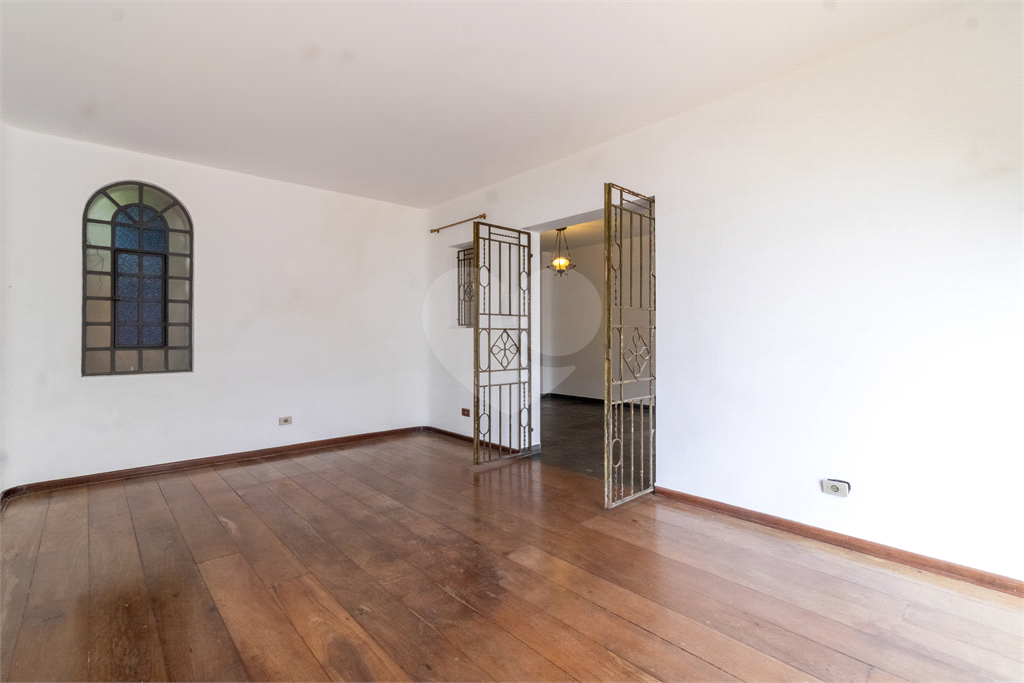Casa com dois lotes no Alto de Pinheiros