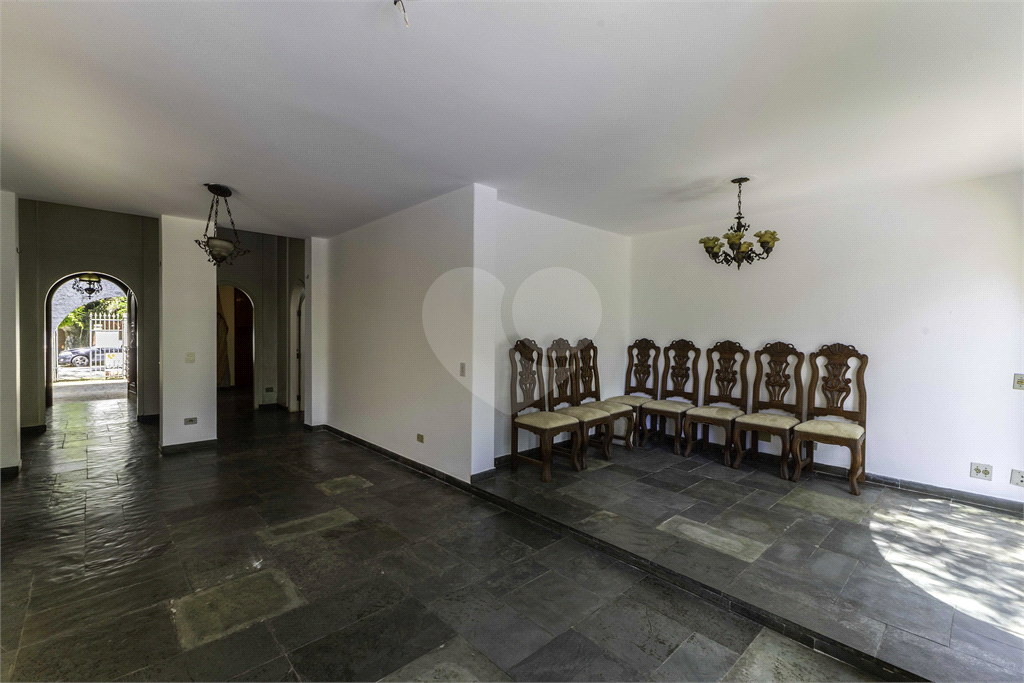 Casa com dois lotes no Alto de Pinheiros