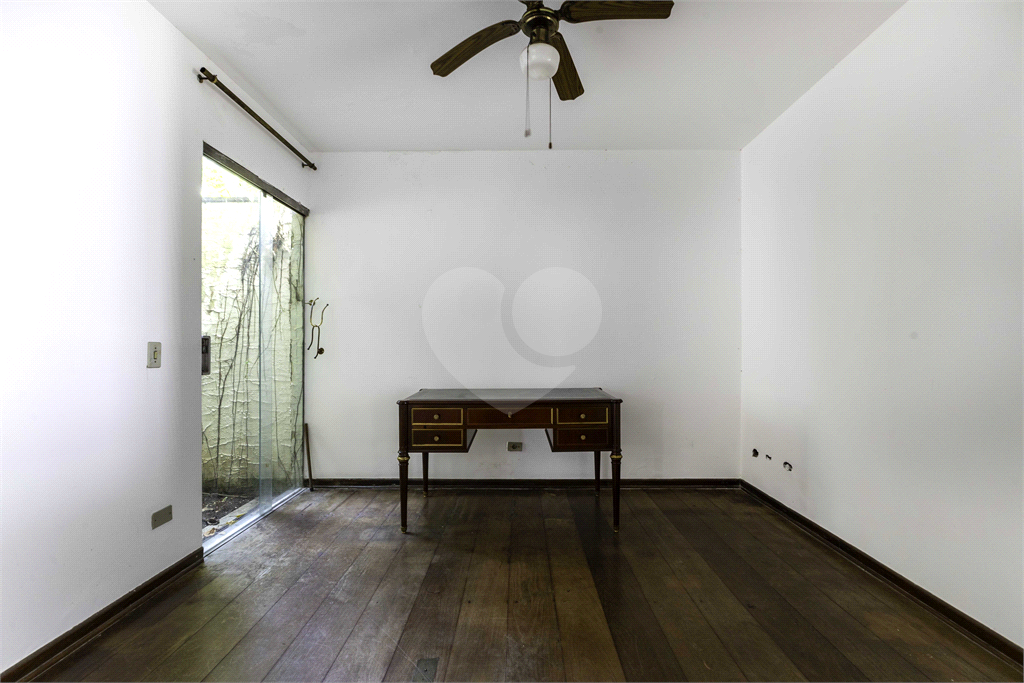 Casa com dois lotes no Alto de Pinheiros