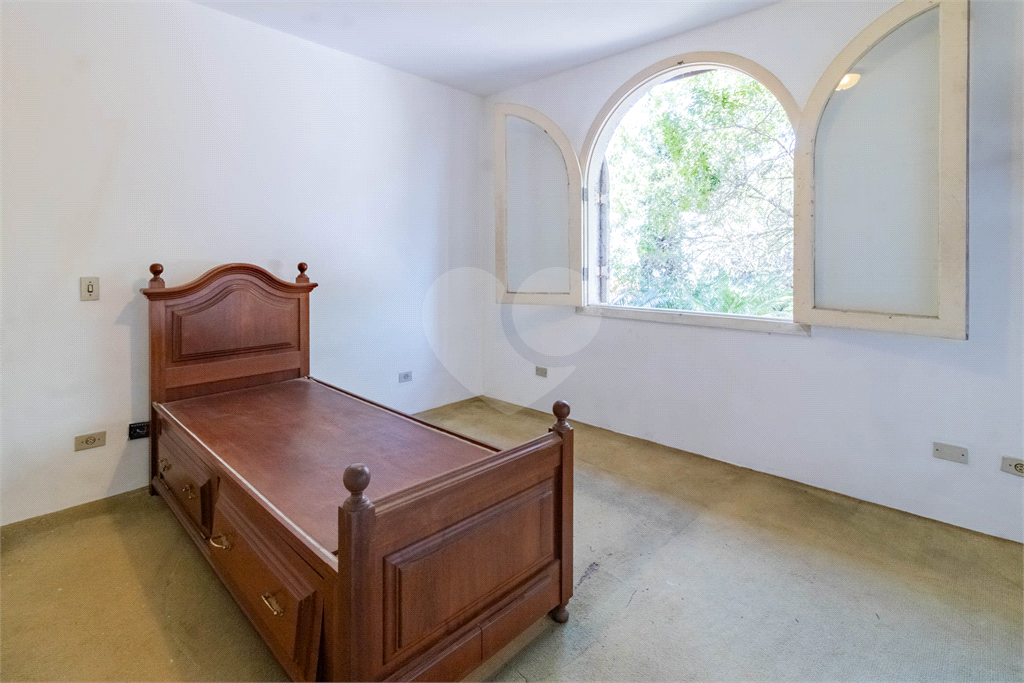 Casa com dois lotes no Alto de Pinheiros