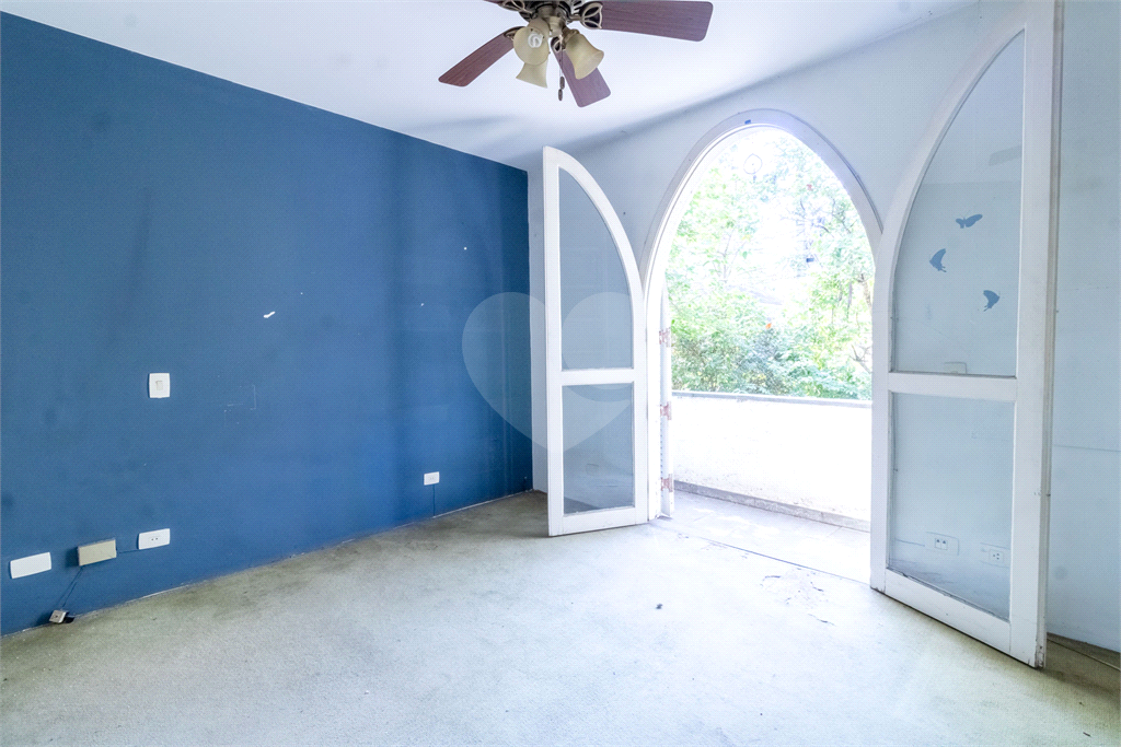 Casa com dois lotes no Alto de Pinheiros