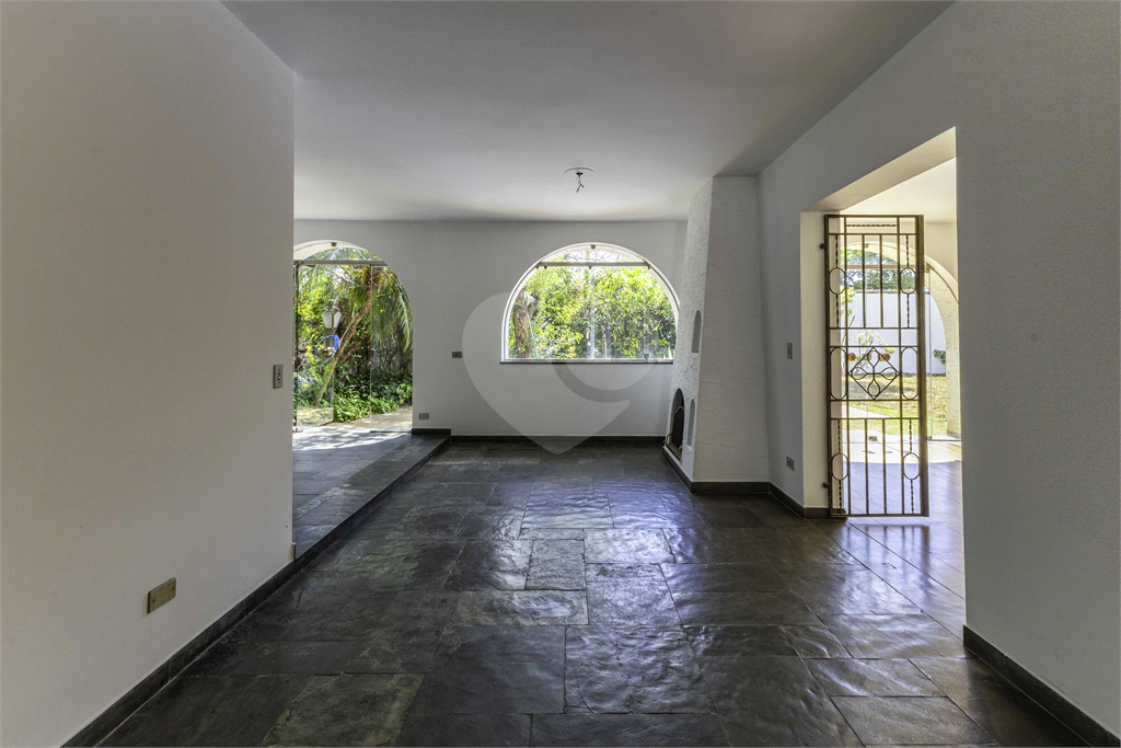 Casa com dois lotes no Alto de Pinheiros