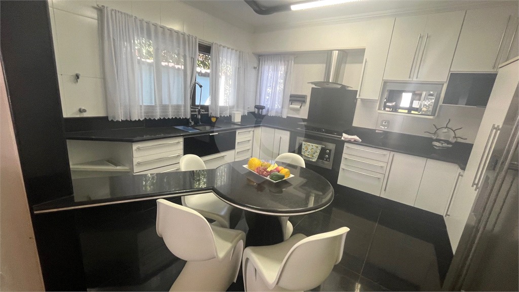 Casa à venda com 4 quartos, 329m² - Foto 5