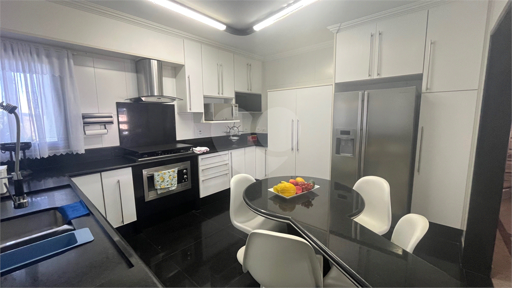 Casa à venda com 4 quartos, 329m² - Foto 7