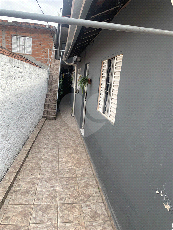 Terreno com Duas Casas – Oportunidade com Renda!